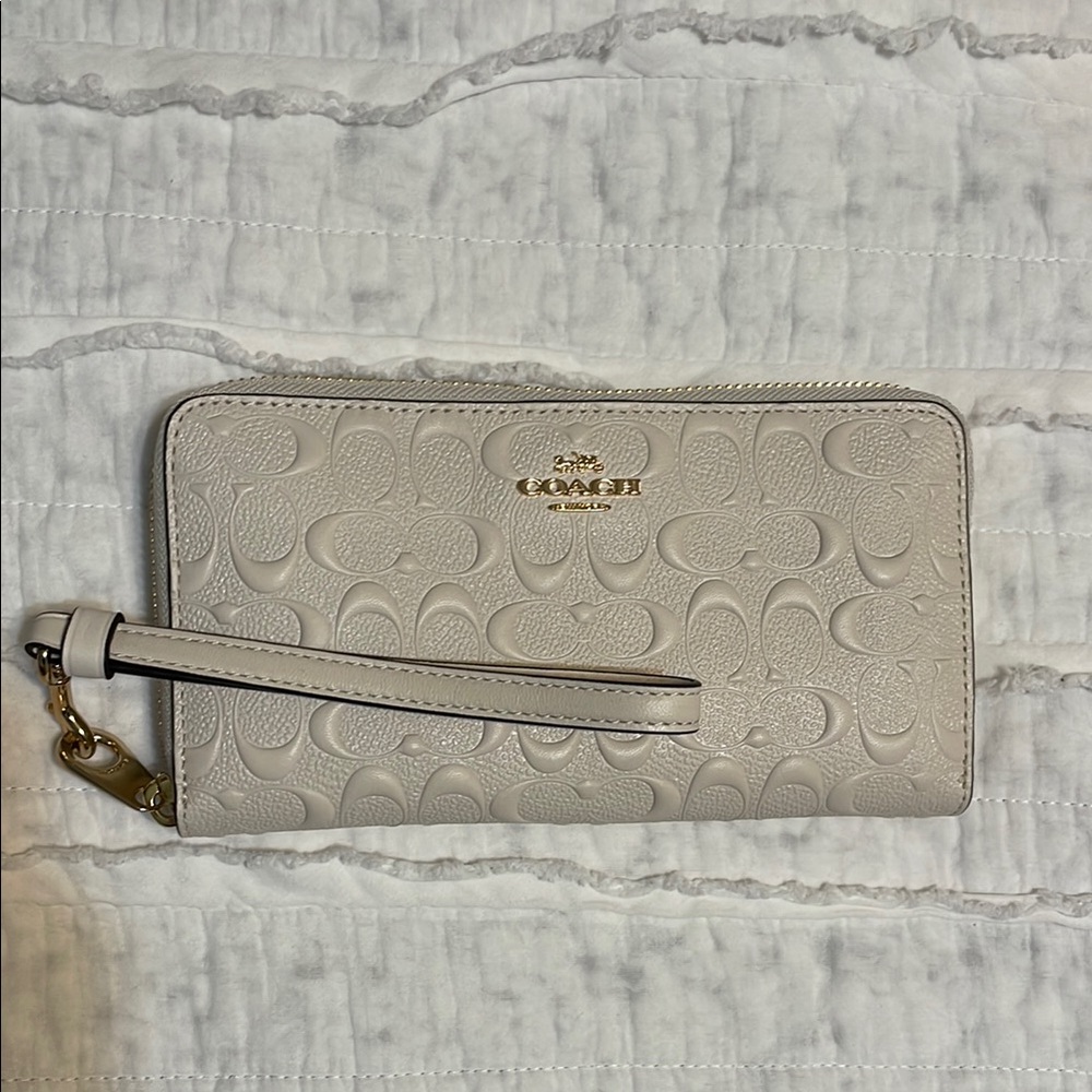Coach Cream Leather Wristlet Clutch with Embossed Design